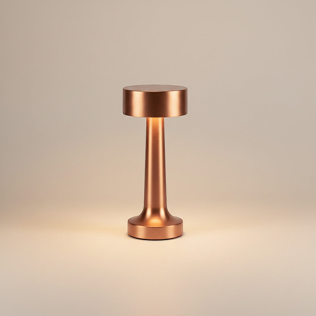 Lysverden brushed aluminum cordless disc-top table lamp with 4 color temperatures and Qi charging.