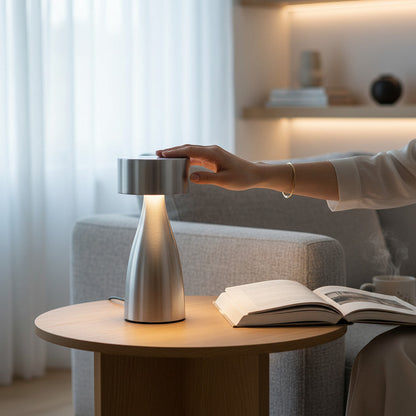 Lysverden brushed aluminum disc-top table lamp with flute stem, touch control, 4 color temperatures, and dimming.
