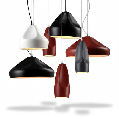 Lysverden ceramic pendant lights in various matte colors and conical shapes hanging in a cluster for modern decor.