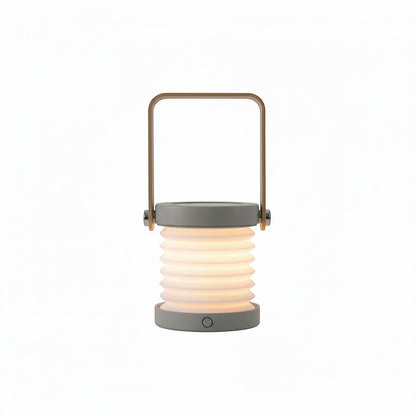 Lysverden collapsible lantern with wood handle, grey base, and accordion paper shade. Touch-controlled, dimmable, rechargeable.