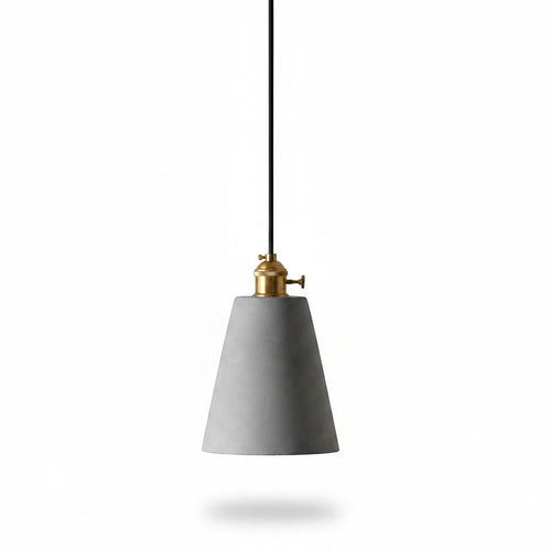 Lysverden industrial concrete pendant lamp with a conical shade and warm brass detailing hanging on a black cord.