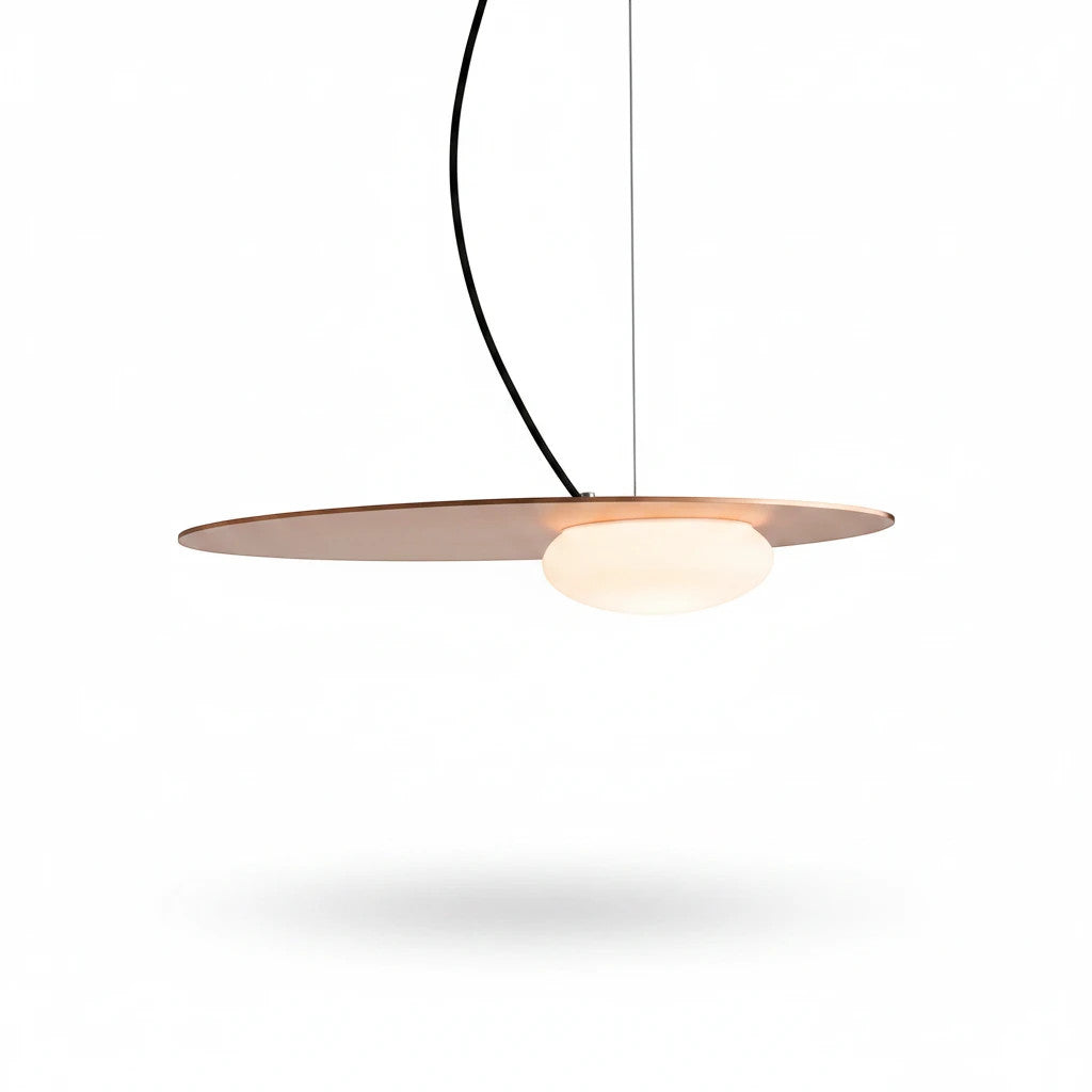 Lysverden copper disc pendant lamp with a soft opal glass globe for warm, glare-free lighting in a minimalist style.