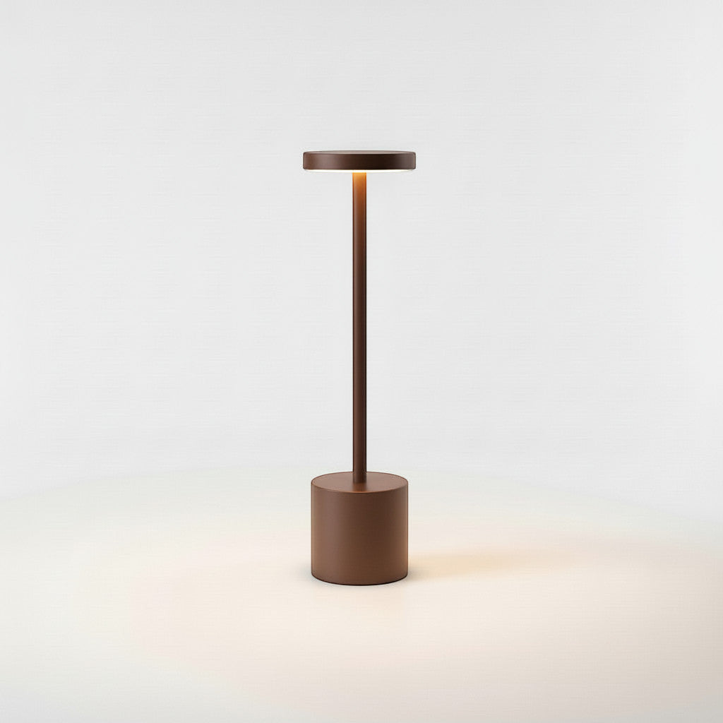 Lysverden cordless disc-top table lamp in brown aluminum with touch control and 3-level dimming.