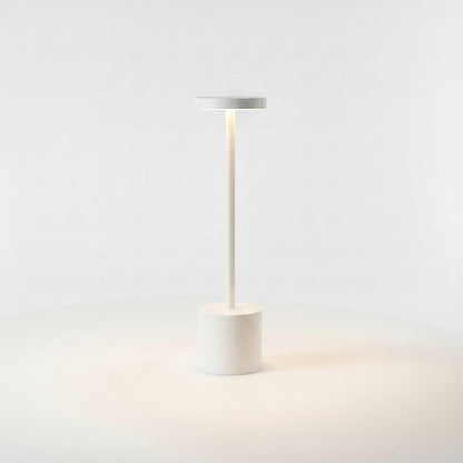 Lysverden cordless disc-top table lamp in brown aluminum with touch control and warm light, available in 3 sizes.