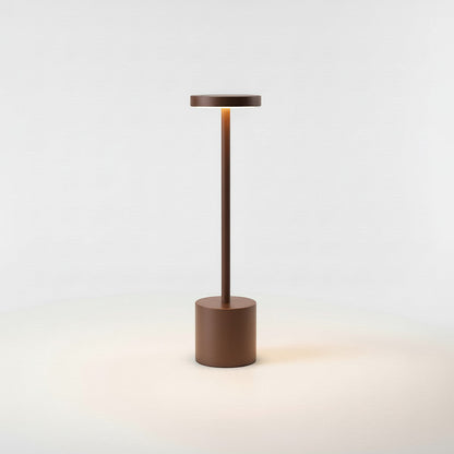 Lysverden cordless disc-top table lamp in dark grey aluminum with touch control and 3-level dimming.