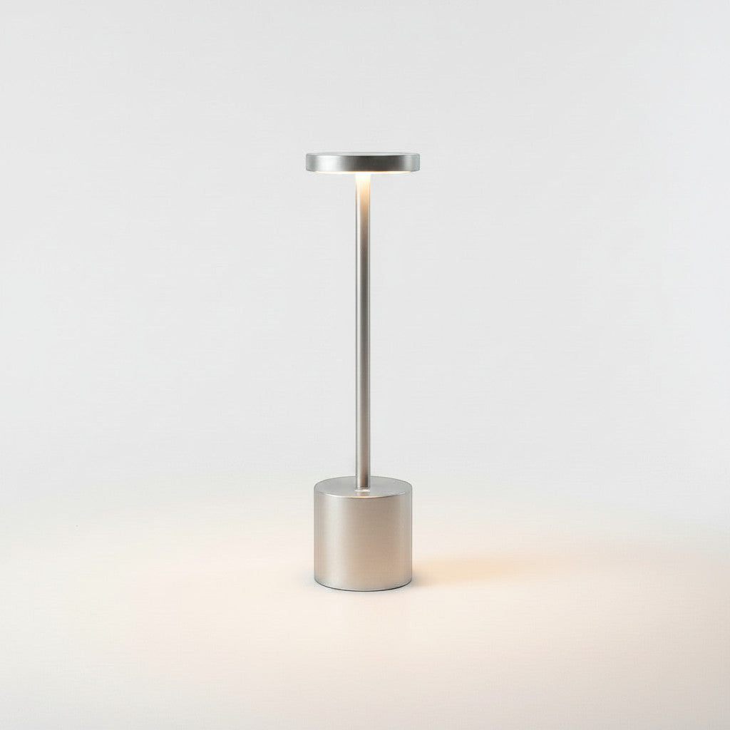 Lysverden cordless disc-top table lamp in brushed gold aluminum with touch control and 3-level dimming.