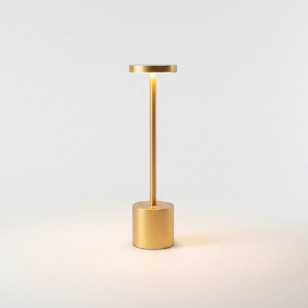 Lysverden cordless disc-top table lamp in gold, silver, black, and white. Available in 3 sizes with touch control and Qi charging.