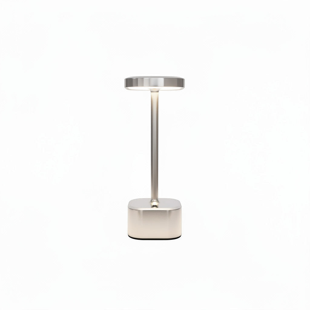 Lysverden cordless gold aluminum table lamp with square base, touch control, 4 color temperatures, and Qi wireless charging.