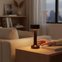 Lysverden cordless table lamp in brushed aluminum with disc top and silicone base, 4 color temperatures, 3-level dimming, Qi charging.