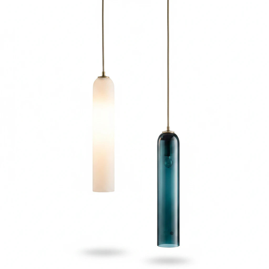 Lysverden modern cylindrical pendant lights in white and blue glass hanging from brass fixtures