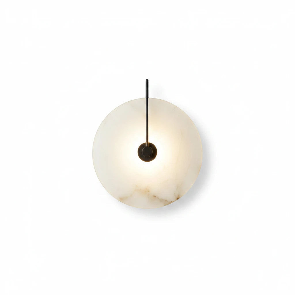 Lysverden Dolomitt wall lamp with a round white stone disc and warm integrated LED light in a minimalist Japandi style.