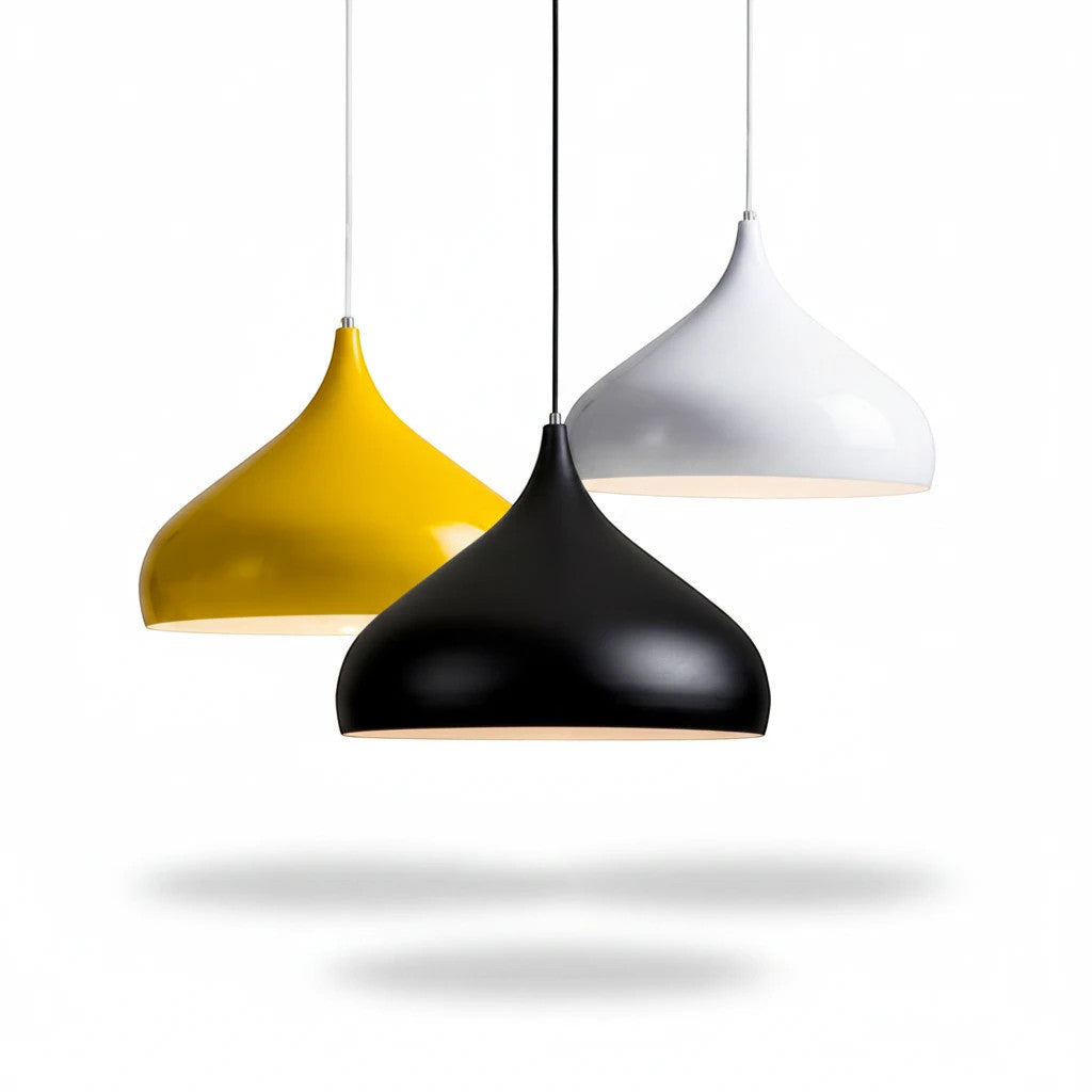 Lysverden dome pendant lights in yellow, black, and white matte metal hanging in a cluster for modern interior lighting.