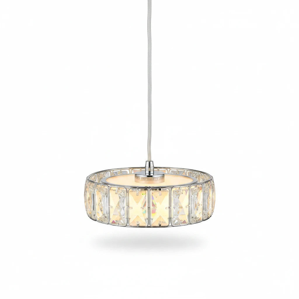 Lysverden drum pendant light with a decorative patterned glass shade and metallic frame for elegant dining room decor.