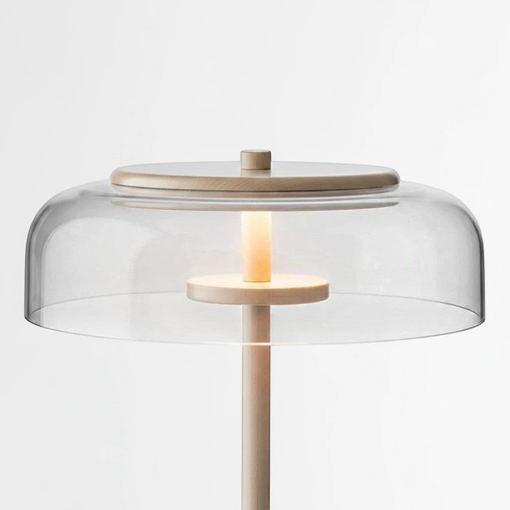Lysverden elegant glass disk lamp with a clear glass shade and warm LED light on a slim metallic stand