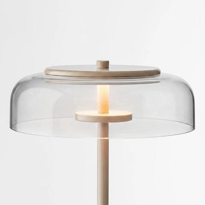 Lysverden elegant glass disk lamp with a clear glass shade and warm LED light on a slim metallic stand