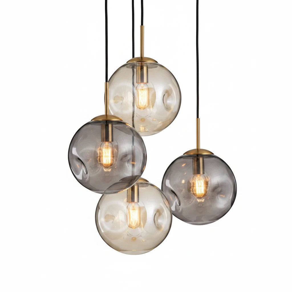 Lysverden glass pendant lamp cluster with hand-blown smoke grey and amber glass spheres and brass fittings.