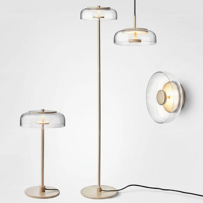 Lysverden glass disk lamp collection in gold brass with clear glass shades and integrated warm LED lighting