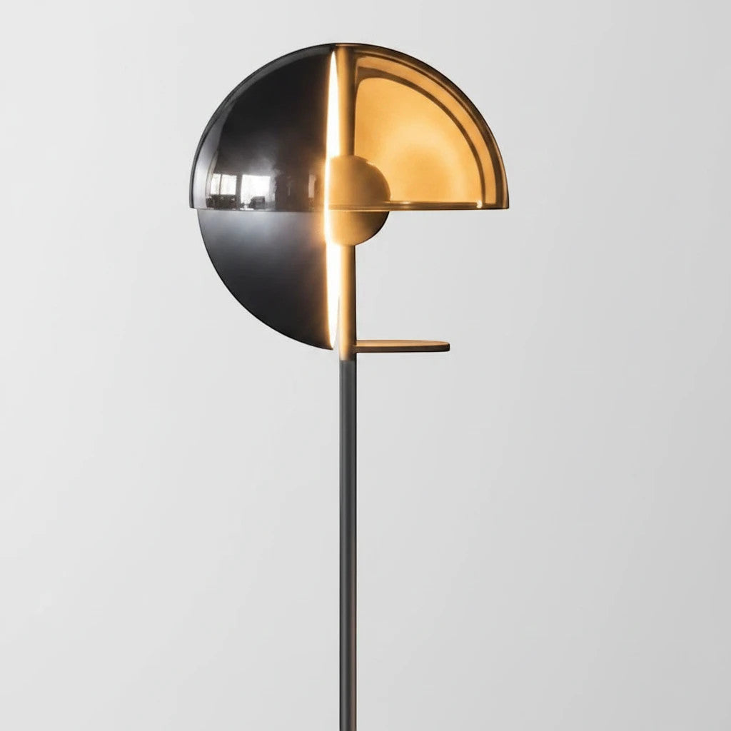 Lysverden floor lamp with a modern gold glass dome shade and sleek metal stand for warm, ambient interior lighting.