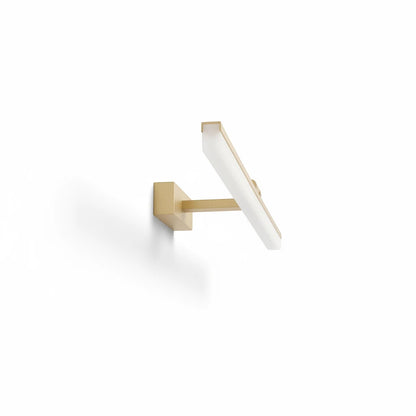 Lysverden gold LED wall lamp with a minimalist linear design for mirrors or artwork, featuring a sleek metal finish.