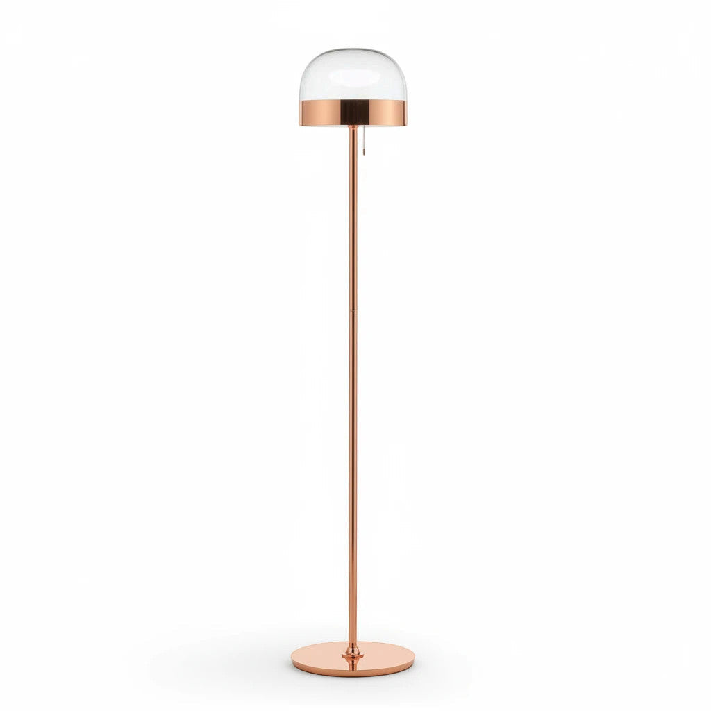 Lysverden floor lamp with a sleek gold metal stand and a modern glass dome shade for soft ambient lighting.