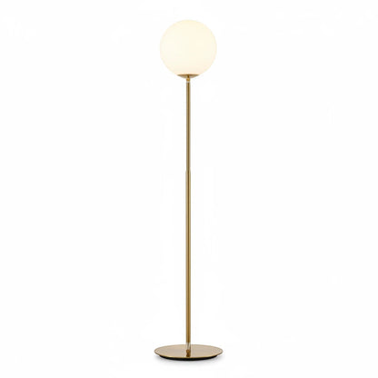 Lysverden floor lamp in gold with a minimalist metal stand and a spherical opal glass shade for soft diffused light.