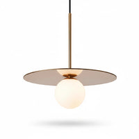 Lysverden Gulldisk pendant light with a brass disc and white opal glass sphere for soft, ambient lighting.