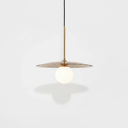 Lysverden Gulldisk pendant lamp with a minimalist gold metal disc and a white opal glass globe for soft lighting.