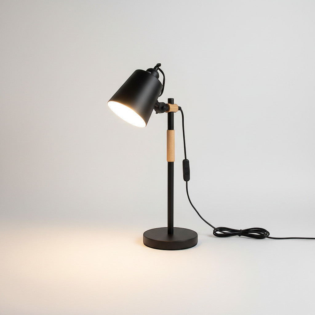 Lysverden industrial desk lamp in black metal with adjustable head and wooden accents. Features E27 socket.