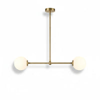 Lysverden linear pendant lamp with brass finish and two opal white glass globes in a mid-century modern style.