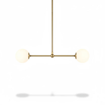 Lysverden linear pendant lamp with a brass finish and two opal white glass globes for soft, glare-free lighting.