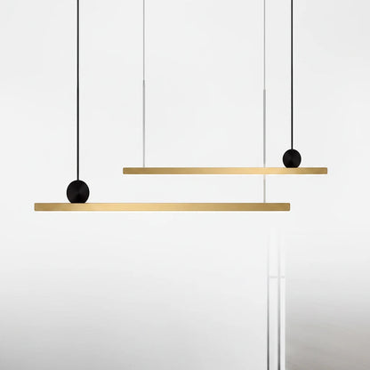 Lysverden linear gold LED pendant light with slim aluminum beam and black spherical accents for modern dining rooms.