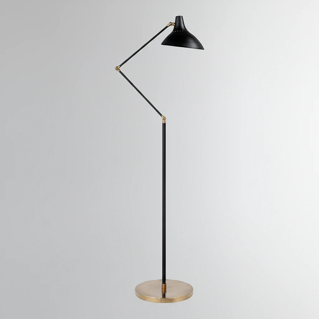 Lysverden LYS floor lamp in matte black with an adjustable shade and elegant brass base for modern interiors.