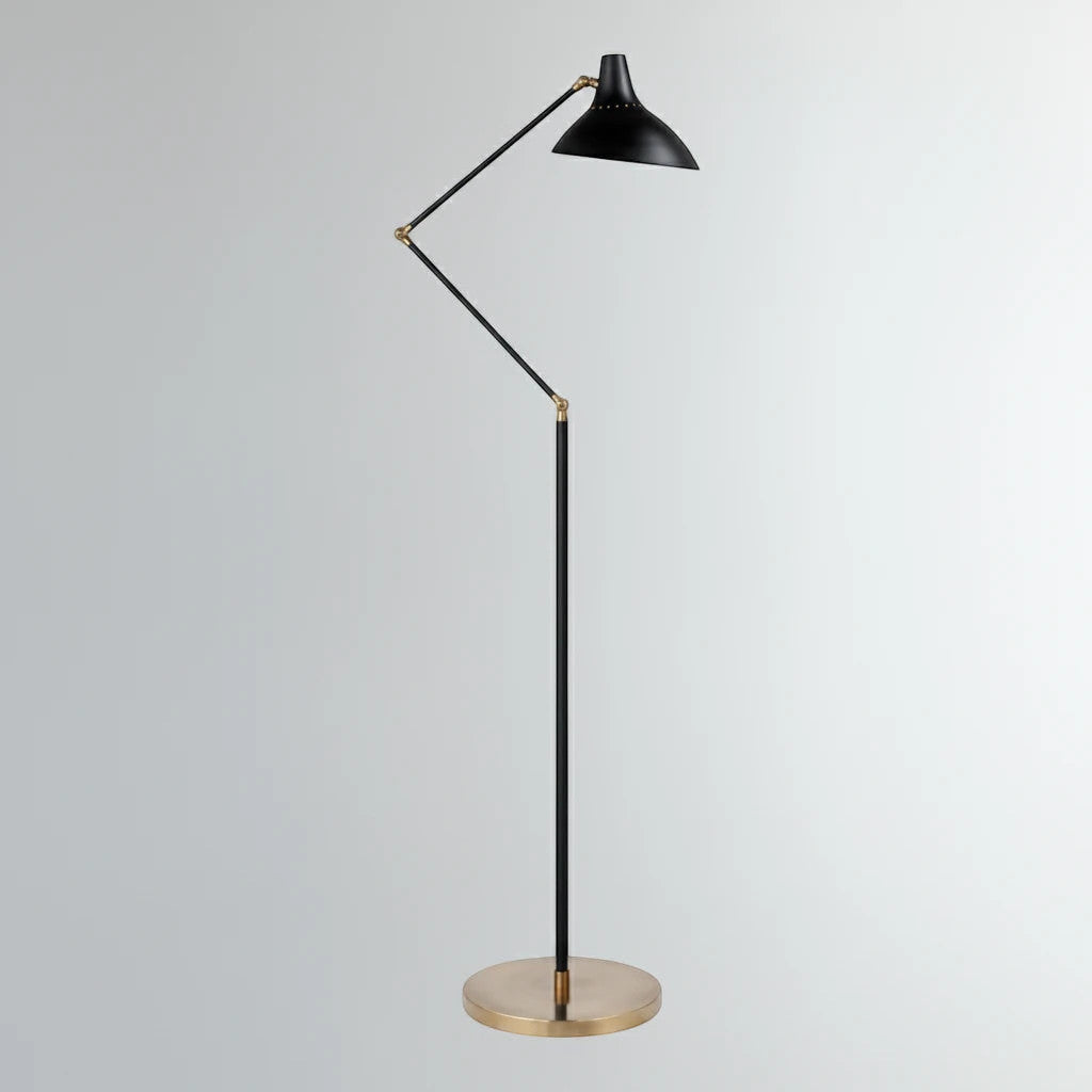 Lysverden LYS floor lamp in matte black with an adjustable shade and elegant brass base in a minimalist design.