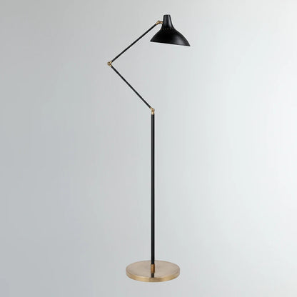 Lysverden LYS floor lamp in matte black with an adjustable shade and elegant brass base in a minimalist design.