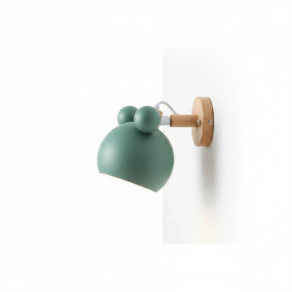 Lysverden Macaron wall lamp in green metal with a natural wood base and adjustable spotlight head.