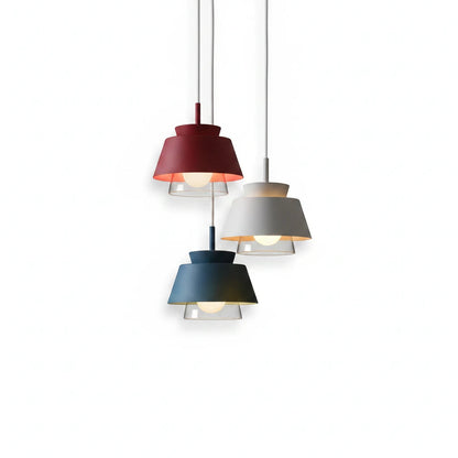 Lysverden Macaron pendant lights with layered metal shades in red, white, and blue hanging in a cluster.