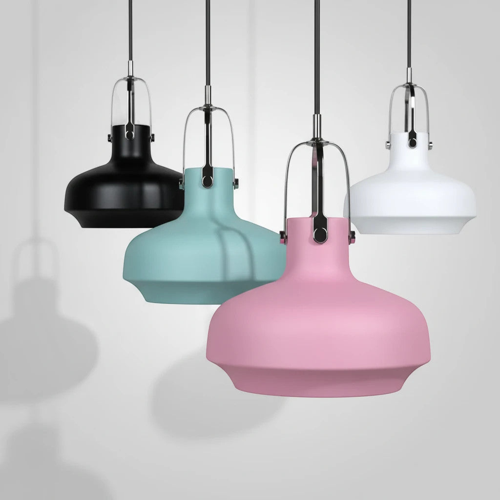 Lysverden Macaron pendant lamps in black, blue, pink, and white with curved metal shades and modern Nordic design.
