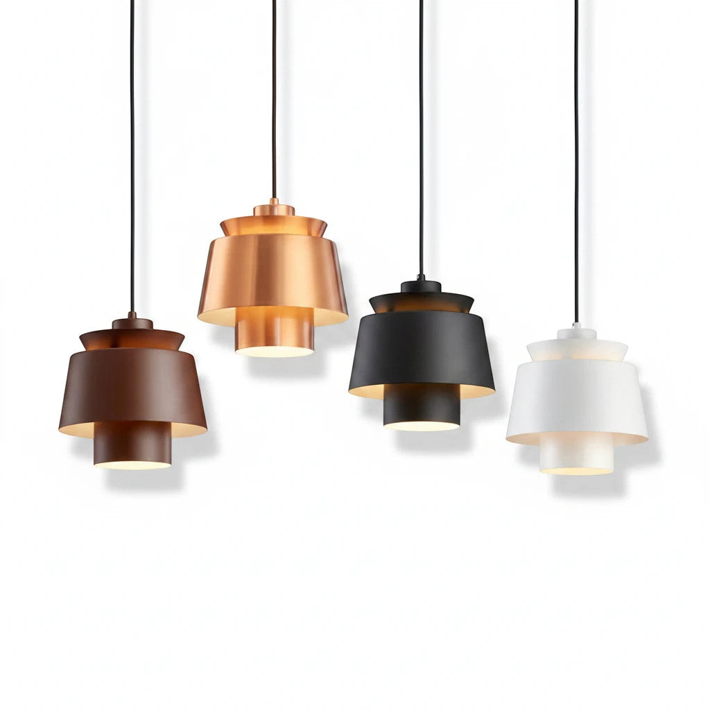 Lysverden metal drum pendant lights in brown, copper, black, and white with a minimalist Scandinavian design.