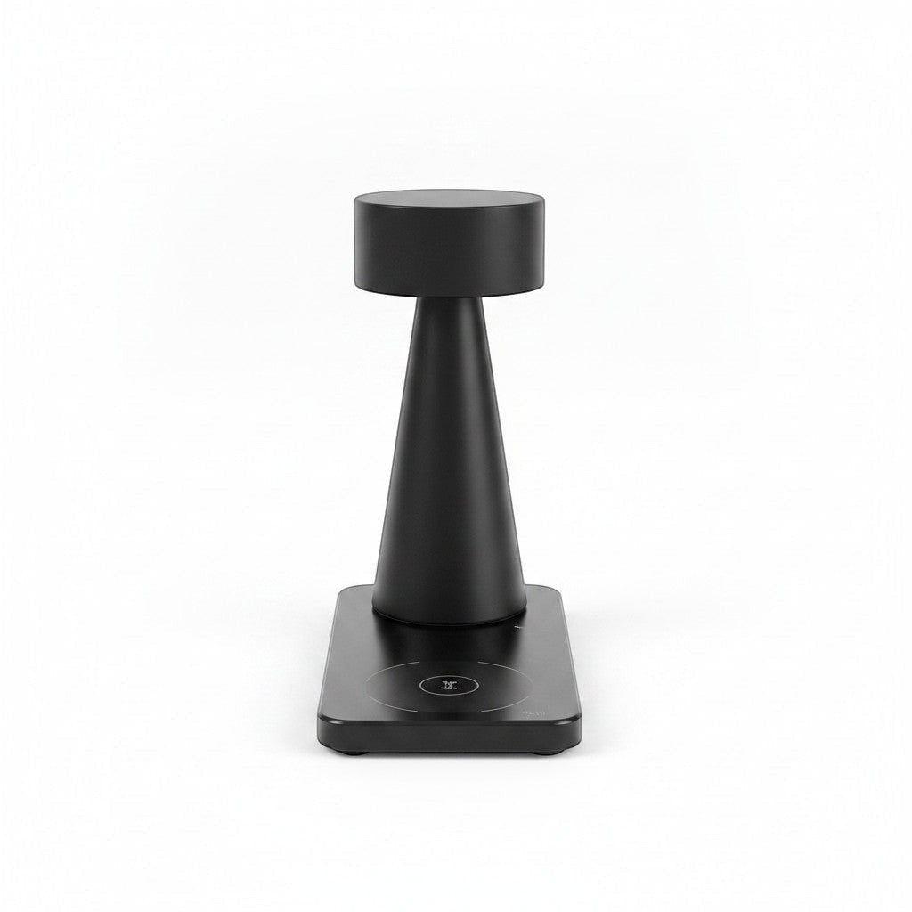 Lysverden black aluminum mini cylinder touch table lamp with Qi charging base, 4 color temperatures, 3-level dimming.