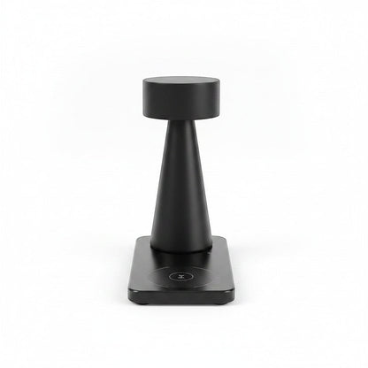 Lysverden black aluminum mini cylinder touch table lamp with Qi charging base, 4 color temperatures, 3-level dimming.