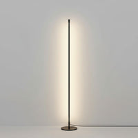 Lysverden minimalist black LED floor lamp with a slim, vertical design providing soft, indirect ambient lighting.