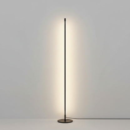 Lysverden minimalist black LED floor lamp with a slim, vertical design providing soft, indirect ambient lighting.