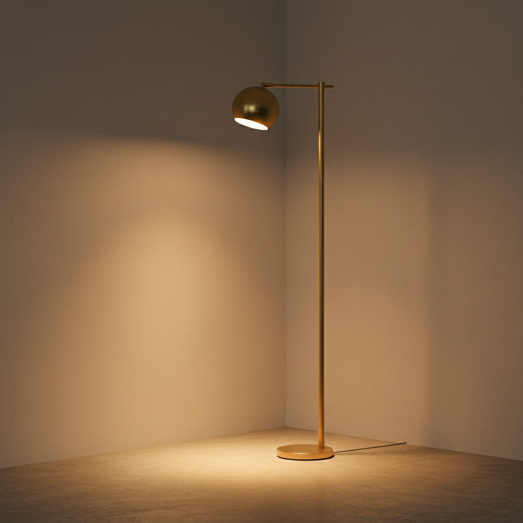Lysverden minimalist gold floor lamp with a slim stem, round base, and adjustable tilting head in a corner setting.
