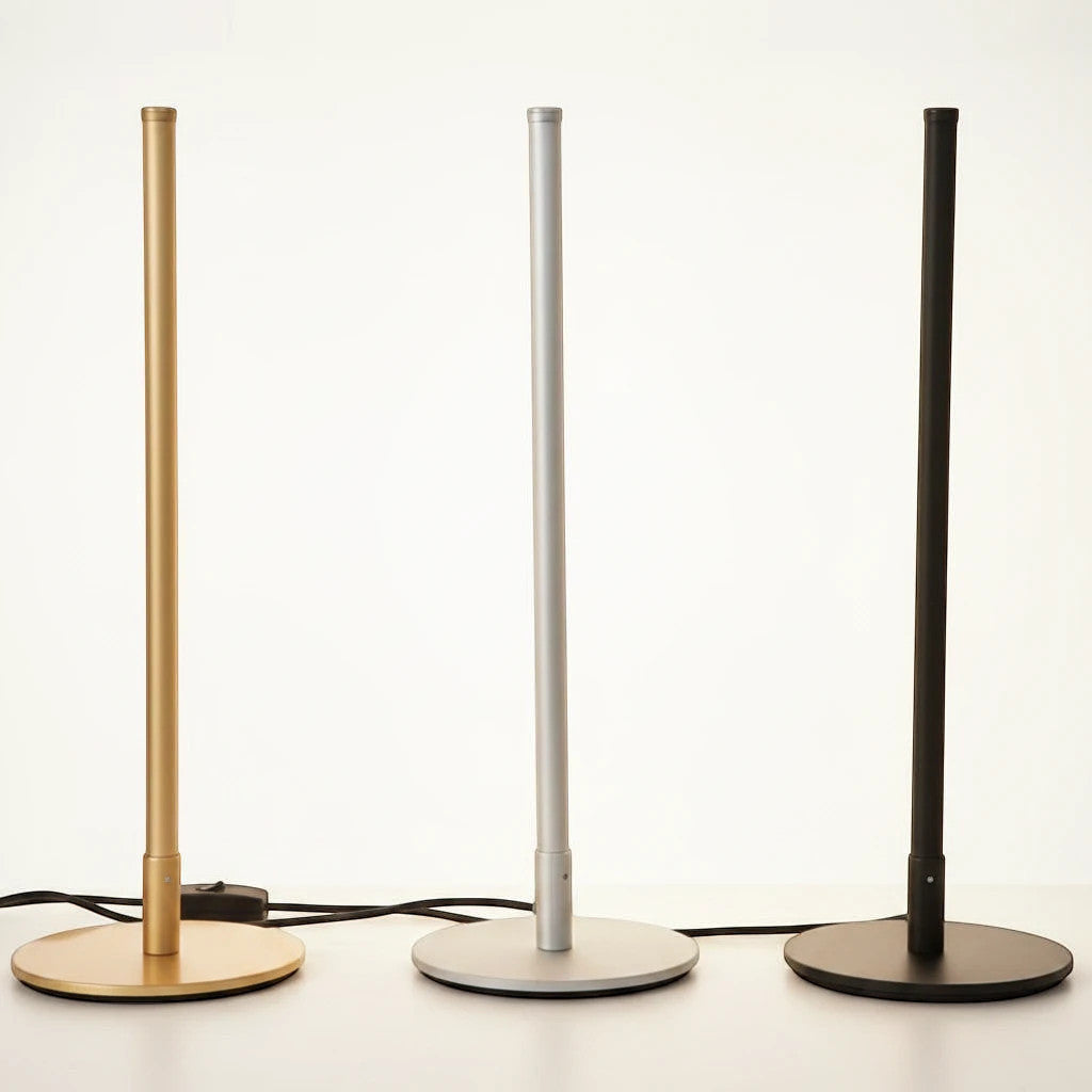 Lysverden minimalist LED floor lamps in gold, silver, and black metal, featuring a slim, modern rod design.