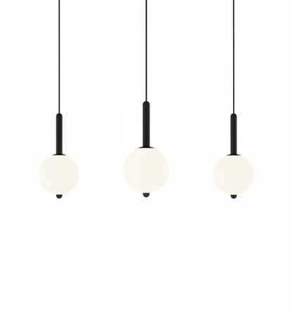 Lysverden minimalist LED pendant lights with glowing white spherical shades on slim black stems in a set of three.