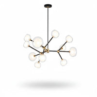 Lysverden Molekyl chandelier with black and gold arms and multiple opal glass globes for elegant modern lighting.