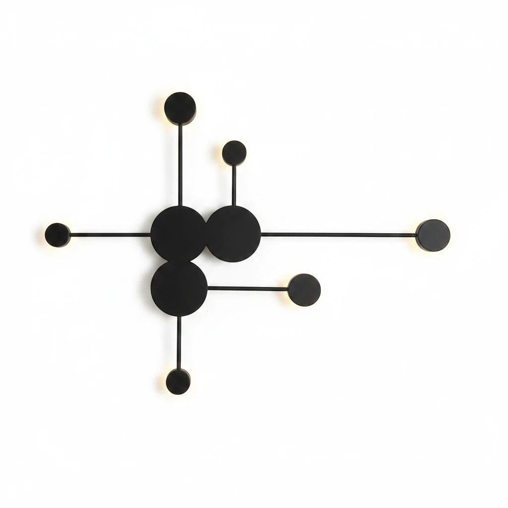 Lysverden Molekyl sputnik wall lamp in black metal with integrated LED light points in a modern architectural design.