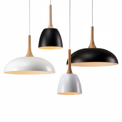 Lysverden Nordic dome pendant lights in black and white metal with natural wood accents hanging in a cluster.