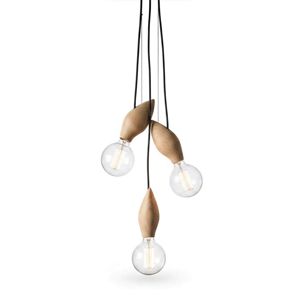Lysverden organic wooden pendant light cluster with three sculptural solid wood fixtures and exposed Edison bulbs.