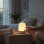 Lysverden portable white ABS mini lantern with touch control, warm white and RGB light, and hidden handle.